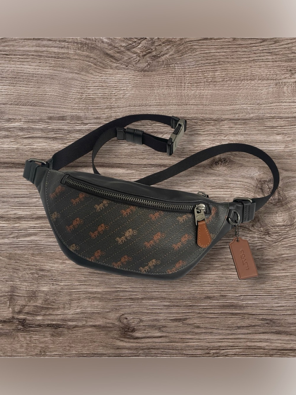 Coach Warren Mini Belt Bag in black with the Horse and Carriage dot print. - Picture 1 of 9